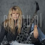 Ad van den Berg at studio in Amsterdam.

[keywords]Posed, Eyecontact, Guitar, Musician, Singer[/keywords]